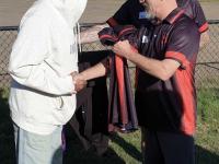 Skipper handing the number 1 jersey over